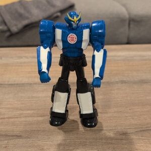 Blue and Black Action Figure